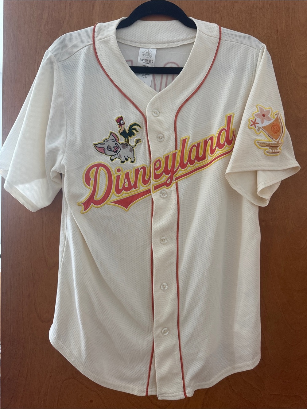 Disney Cream Baseball Jersey with Red Trim and Yellow Logo- Moana